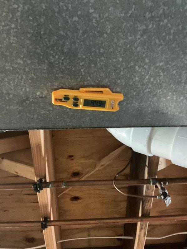 Performed comprehensive cooling system maintenance on residential HVAC unit. Conducted electrical diagnostics using digital multimeter to verify proper voltage and amperage readings at the outdoor condensing unit, measuring capacitor performance and compressor draw. Inspected indoor air handler components in attic space, verifying proper operation of all electrical connections and refrigerant line integrity throughout the system.