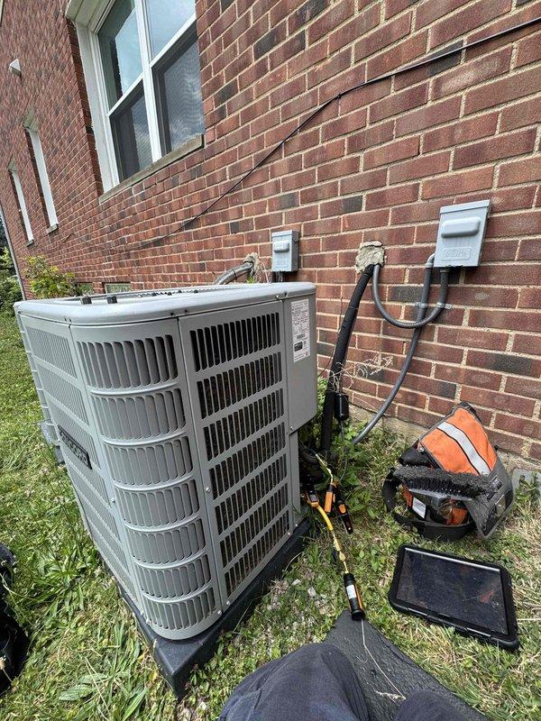 Performed diagnostic evaluation and repair on residential air conditioning system using R410A refrigerant. Upon arrival, connected digital manifold gauges and temperature probes to assess system performance. Measured operating pressures with suction side reading 153.4 psi (54.0°F saturation temperature) and liquid line pressure at 381.3 psi (112.9°F saturation temperature). Recorded line temperatures of 64.3°F on suction line and 98.6°F on liquid line, calculating superheat at 10.3°F and subcooling at 14.3°F. System parameters indicated proper refrigerant charge and normal operating conditions. Verified condenser unit operation at outdoor location, confirmed all electrical connections secure at disconnect box, and ensured refrigerant lines properly insulated. System restored to optimal cooling performance with all measurements within manufacturer specifications.