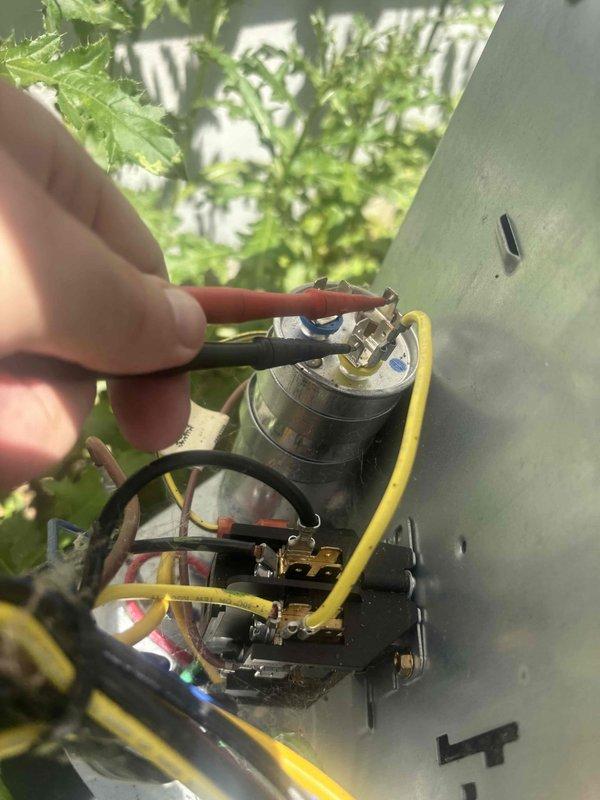 Performed comprehensive cooling system tune-up on outdoor HVAC unit. Inspected and tested electrical components including dual capacitors and contactor assembly, verified all wire connections and terminals for proper seating and condition, and confirmed system operational readiness for continued cooling season performance.