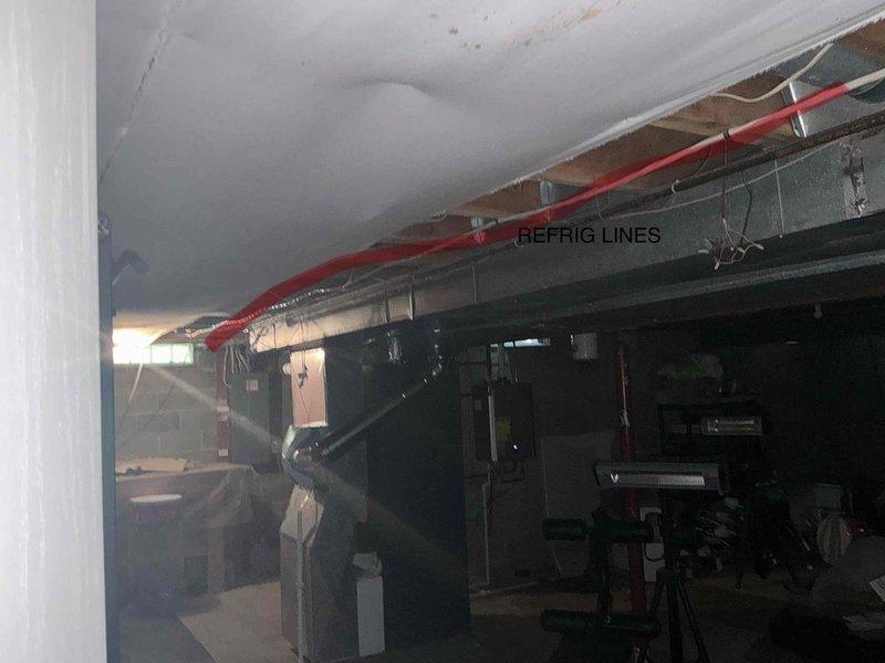 Completed full HVAC system replacement including installation of new air handler in mechanical room and outdoor condensing unit on exterior concrete pad. Refrigeration lines were properly labeled and secured, all equipment mounted and connected per manufacturer specifications, and system commissioned for optimal operation.
