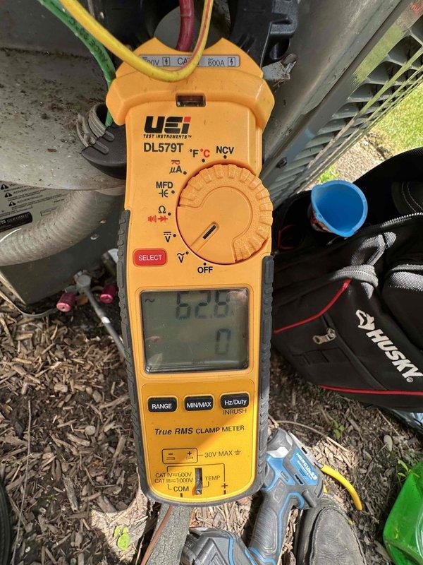 Completed routine cooling season maintenance on residential air conditioning system. Performed electrical diagnostics using clamp meter to verify proper amperage draw and system performance, inspected and tested disconnect block with cartridge fuses for secure connections and proper operation. All components operating within normal parameters, system ready for cooling season demands.