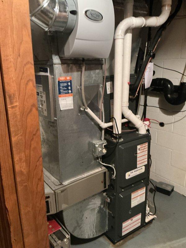 Completed preventive maintenance on two residential cooling systems. Performed comprehensive inspection of both HVAC units including temperature diagnostics, measuring supply air temperature at 85.5°F on ductwork. Inspected furnace with humidifier system, condensate pump, and associated PVC drainage lines. Verified proper operation of all equipment components, checked electrical connections, and confirmed system functionality for continued reliable cooling performance.