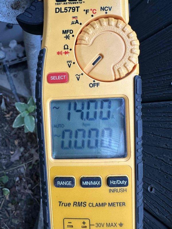 Completed comprehensive cooling season tune-up on outdoor condensing unit. Performed standard maintenance procedures including electrical testing with clamp meter showing 14.0 amp draw, inspected refrigerant lines and electrical connections, and verified proper system operation. Unit found to be functioning within normal parameters with all components operating as designed.