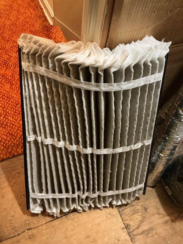 Responded to service call and accessed property through side door as arranged. Removed heavily soiled pleated air filter from HVAC system showing significant dust and debris accumulation. Installed new replacement filter to restore proper airflow and system efficiency. System operational upon completion.