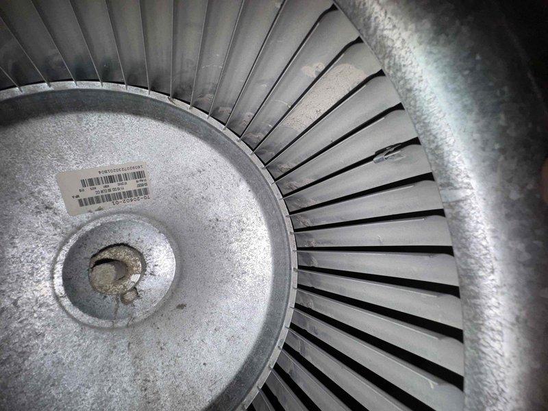 Responded to no cooling complaint on residential A/C system. Upon inspection, found blower wheel heavily coated with dust and debris accumulation, restricting airflow through the system. Connected refrigeration gauges and diagnostic equipment to evaluate system performance, revealing R22 refrigerant with suction pressure at 73.2 psi (43.1°F saturation temperature) and discharge pressure at 374.7 psi (148.5°F saturation temperature). Measured superheat at 26.2°F and subcooling at 58.6°F, indicating refrigerant charge issues in addition to airflow restrictions. Cleaned blower wheel assembly to restore proper airflow. System operational upon departure with improved cooling performance.