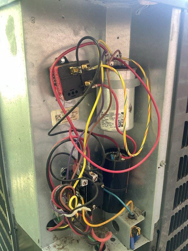 Performed routine cooling maintenance on outdoor Unico air conditioning system. Inspected electrical components including contactor, capacitor, and wiring connections within the control compartment, and evaluated overall unit condition including fan assembly and exterior housing. Appointment was rescheduled from original date to complete the preventive maintenance service.