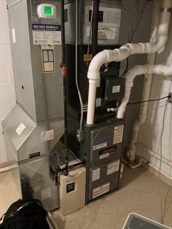 Completed annual cooling maintenance on residential HVAC system with multiple air conditioning units as part of preventive maintenance program. Accessed equipment through garage entry, performed comprehensive inspection of furnace, air handler, and associated electrical components, verified system temperatures and operational parameters, and documented equipment condition with thermal readings showing proper performance at -70.2°F on refrigerant lines.