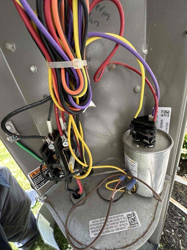 Performed comprehensive cooling season tune-up on residential HVAC system. Conducted thorough inspection of outdoor condensing unit, verifying proper operation of compressor, condenser fan motor, and contactor. Inspected and documented control board condition, noting all electronic components, relay modules, and low-voltage wiring connections were secure and functioning correctly. Verified capacitor specifications and electrical connections at terminal blocks. All system components found operating within normal parameters with no signs of wear, damage, or deterioration requiring immediate attention.