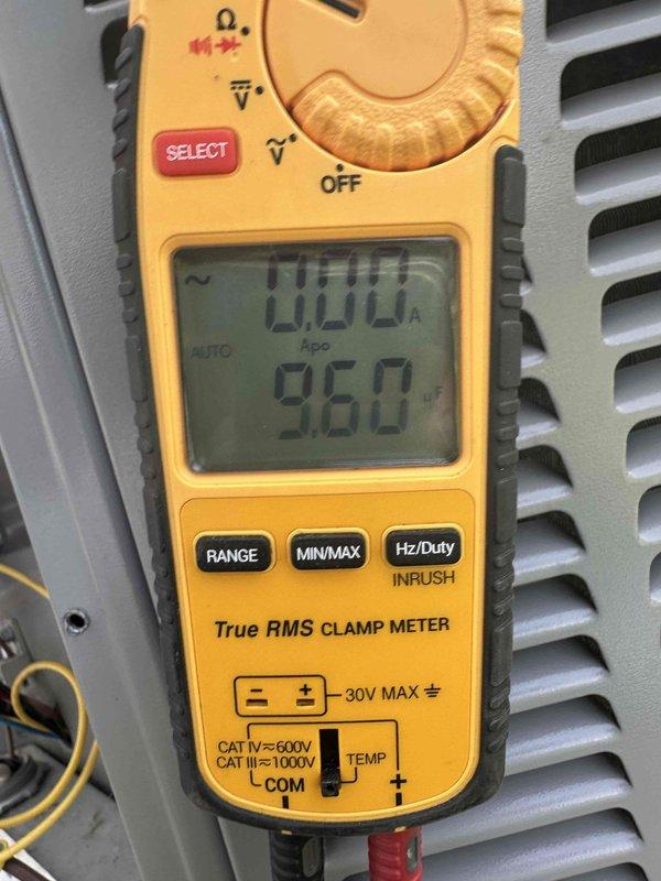 Completed routine cooling system maintenance on residential HVAC unit. Performed comprehensive inspection of electrical components including capacitor and wiring connections, verified all terminals secure with proper color-coded connections intact. Conducted amperage readings using clamp meter, confirming system drawing 0.00A at time of measurement with voltage reading of 960, indicating unit was not in active cooling cycle during testing. Inspected interior cabinet components, verified capacitor mounting and electrical connections showing normal wear consistent with operational equipment. All accessible components examined and found functioning within normal parameters. Customer advised that equipment age records require updating, as unit is approximately 2 years old rather than 8 months as currently documented in system records.