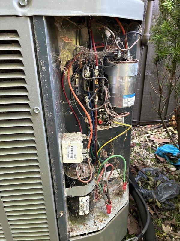 Responded to customer complaint of squeaking noise from outdoor condensing unit. Upon arrival, performed diagnostic inspection and found unit operational but noted significant debris accumulation inside cabinet and dirty air filter (16x20x1) at indoor air handler. Inspected all mechanical components including compressor, condenser fan motor, and fan blade assembly for source of noise complaint. Verified capacitor operation and electrical connections at contactor. Previous service history indicated unit had been extensively disassembled for minor issue. Completed visual inspection of all accessible components, documented unit condition with photos showing interior cabinet condition and filter specifications. Unit running at time of inspection with no immediate squeaking noise detected during service call.