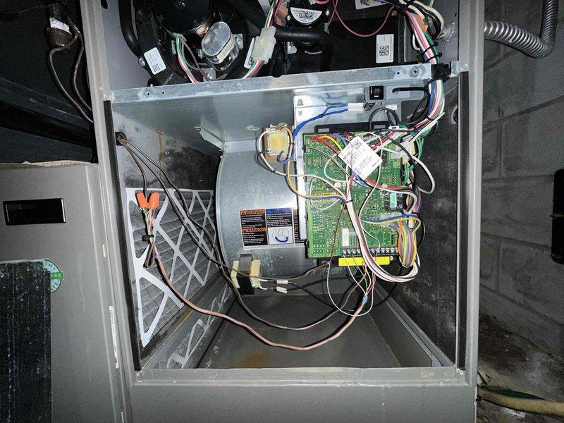 Completed comprehensive cooling maintenance on two residential HVAC systems. Performed thorough inspection of both units including examination of internal components, control boards, wiring connections, and blower assemblies. Verified proper operation of all electrical components, checked fuse integrity on outdoor condensing unit, and confirmed all safety labels and warning decals were intact. Inspected air filtration system and ensured all mechanical and electrical connections were secure throughout both systems.