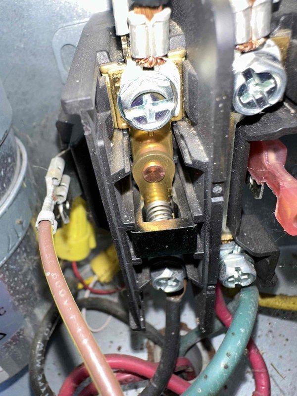 Completed comprehensive cooling season tune-up on HVAC system. Inspected and serviced electrical connections at contactor assembly, verified all wire terminations were secure, and confirmed proper operation of control circuits. All components found in satisfactory working condition with system operating within normal parameters.