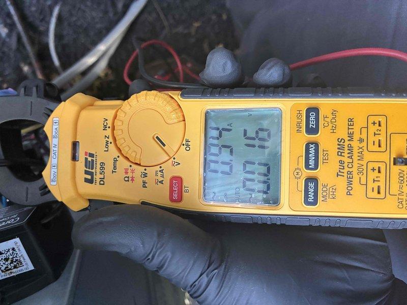 Responded to callback for recurring noise issue following previous service visit. Performed diagnostic evaluation of air conditioning system using clamp meter to measure electrical parameters. Recorded voltage and amperage readings at multiple test points to assess compressor and electrical component performance. Documented system operating conditions with detailed measurements to identify source of abnormal noise complaint.