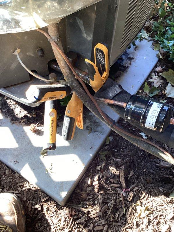 Completed comprehensive cooling season tune-up on outdoor condensing unit, including system diagnostics with digital meters to verify refrigerant pressures and electrical performance. Inspected copper refrigerant lines, condensate drainage system, and all exterior components; unit operating within manufacturer specifications with no immediate service needs identified.