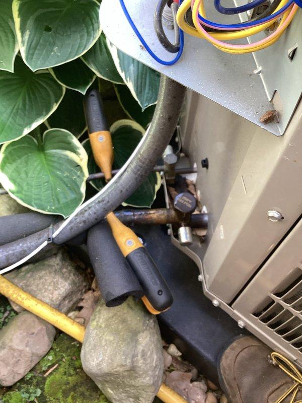 Completed comprehensive cooling system tune-up on residential air conditioning unit. Performed standard maintenance procedures including inspection of outdoor condenser unit, refrigerant lines with proper insulation intact, and blower wheel assembly showing normal operational wear. All components found in satisfactory working condition with system operating within manufacturer specifications.