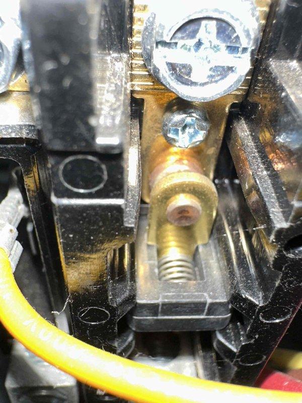 Completed routine cooling system maintenance visit on residential air conditioning unit. Inspected electrical connections at terminal block, verifying secure wire terminations and proper grounding. Measured ambient temperature at equipment location reading 62.0°F. All electrical components showed normal wear patterns with connections intact and functioning within specifications. System operational and ready for cooling season.
