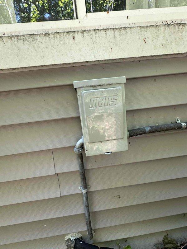 Completed routine cooling maintenance on residential cylindrical air conditioning condenser unit. Performed standard inspection of outdoor unit including condenser coils, fan operation, and electrical connections at exterior disconnect box. Unit operational and ready for continued service through the cooling season.