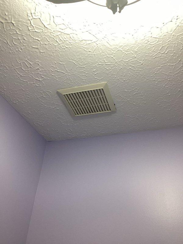 Conducted electrical assessment at recently purchased residential property to evaluate minor electrical issues including non-functional bathroom exhaust fan and problematic outlets. Inspected ceiling-mounted ventilation system and documented existing conditions of electrical fixtures throughout the affected areas.
