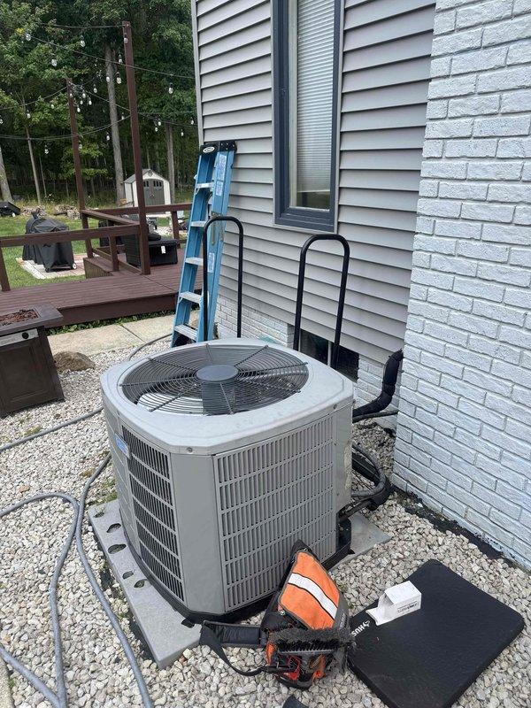 Responded to no cooling condition on 11-year-old residential air conditioning system affecting entire home. Upon inspection of outdoor condenser unit, identified failed dual run capacitor exhibiting severe corrosion and rust on terminals and casing. Removed defective capacitor and installed new JARD replacement capacitor with proper microfarad rating. Verified all electrical connections, tested system operation, and confirmed proper cooling restoration to residence.