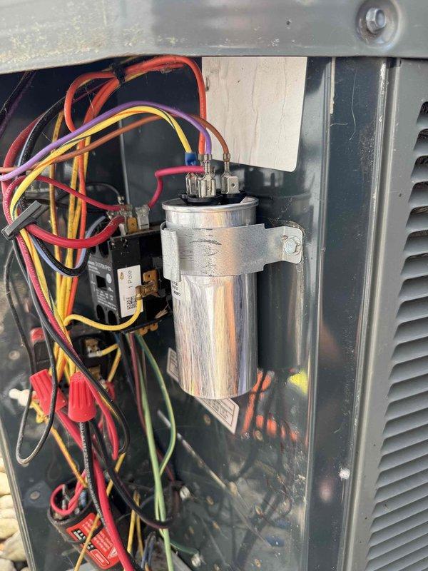 Responded to no cooling condition on older Trane unit that had been previously diagnosed. Upon arrival, performed electrical diagnostics using digital testing equipment and inspected the outdoor unit's electrical components including the capacitor, contactor, and associated wiring connections. System required attention to previously quoted repairs to restore cooling operation.