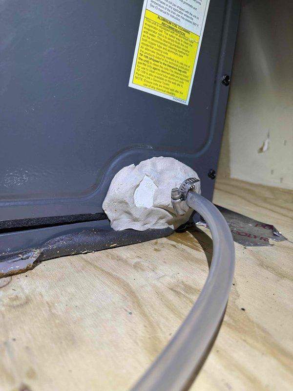 Responded to recurring water leak issue on HVAC system that was previously reinstalled 1.5 months prior. Upon arrival, observed heavy condensation and frost accumulation on supply ductwork indicating ongoing moisture problem that has caused property damage. Inspected condensate drain system and confirmed water sensor safety float switch is malfunctioning and not shutting down unit when water is present. Documented extensive condensation on metal ductwork and inadequate insulation at duct seams, as well as condensate management system requiring repair to prevent further water damage.