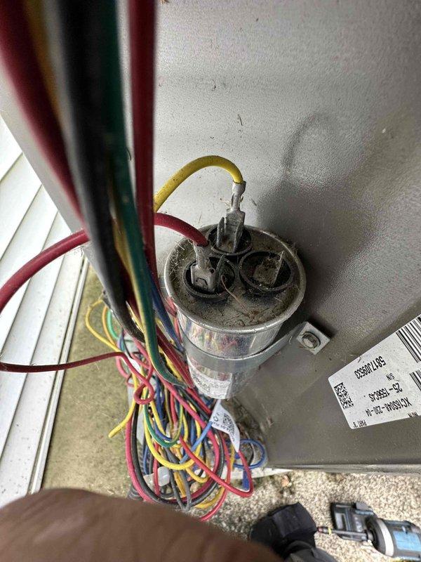 Completed routine cooling system maintenance including inspection of electrical components and capacitor. Verified proper wire connections and control system functionality. Replaced air filtration media with new pleated filter, removing soiled filter from system. Inspected HVAC unit interior components for proper operation and cleanliness.