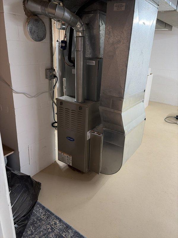 Completed cooling tune-up on Carrier furnace system with air handler in basement utility area. Performed standard maintenance inspection, verified system operation, and recorded supply air temperature of 75.0°F at the ductwork. All equipment functioning properly with no issues identified during the service visit.