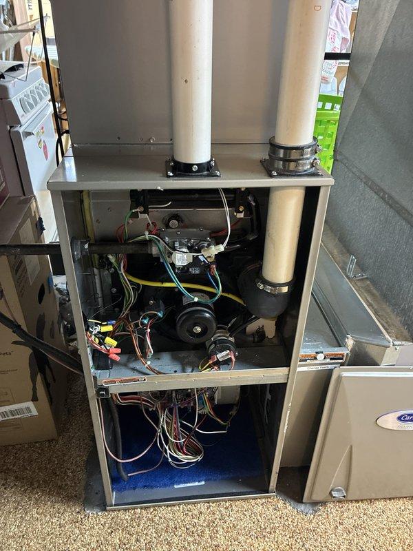 Performed diagnostic evaluation on residential HVAC system and documented existing equipment configuration. Inspected electrical panel, furnace cabinet with blower assembly, and associated wiring connections to assess system condition and provide replacement options to customer.