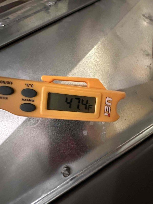 Completed scheduled HVAC cooling system maintenance on residential unit. Performed comprehensive inspection of air handler components, verified electrical connections at terminal blocks, and documented system temperatures with supply air reading of 47.4°F, confirming proper cooling operation and airflow performance.