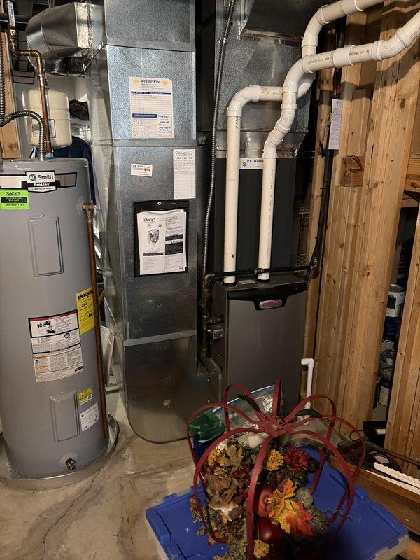 Completed seasonal cooling tune-up on residential HVAC system. Inspected furnace/air handler unit and associated mechanical equipment, checked refrigerant levels, electrical connections, and system operation. Replaced dirty air filter which showed significant dust accumulation and reduced airflow capacity.