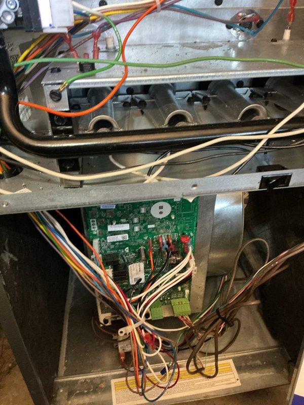 Responded to no cooling call on Bryant furnace system that had been inoperative since Thursday evening. Upon arrival, accessed unit and inspected control board and electrical components. Performed diagnostic evaluation of internal wiring, control circuitry, and system connections. Documented equipment condition through detailed photography of control board, wiring configuration, and internal components for service records. Communicated findings and service actions through interpreter to ensure customer understanding throughout the service visit.