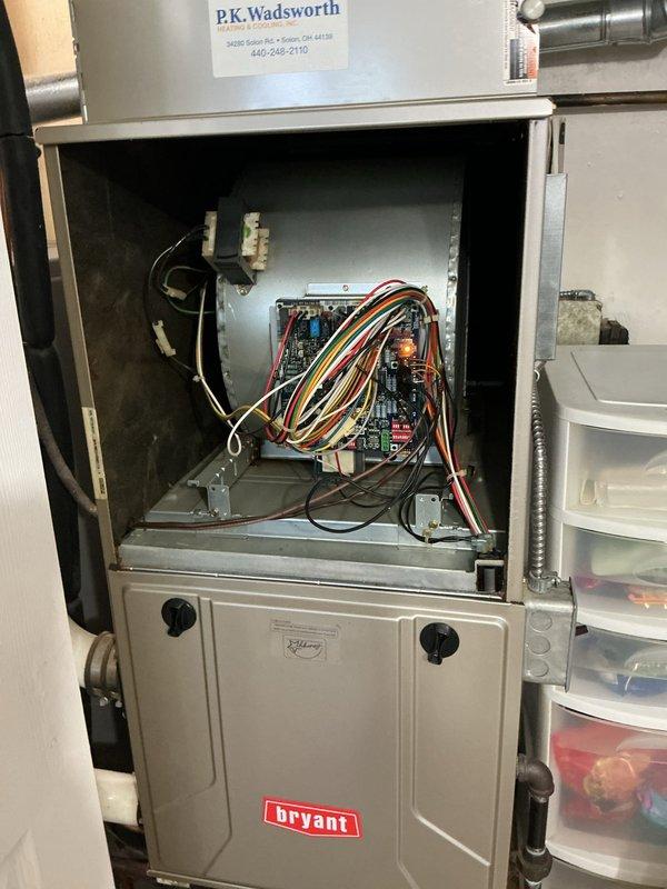 Responded to no cooling call on Bryant furnace system that had been inoperative since Thursday evening. Upon arrival, accessed unit and inspected control board and electrical components. Performed diagnostic evaluation of internal wiring, control circuitry, and system connections. Documented equipment condition through detailed photography of control board, wiring configuration, and internal components for service records. Communicated findings and service actions through interpreter to ensure customer understanding throughout the service visit.