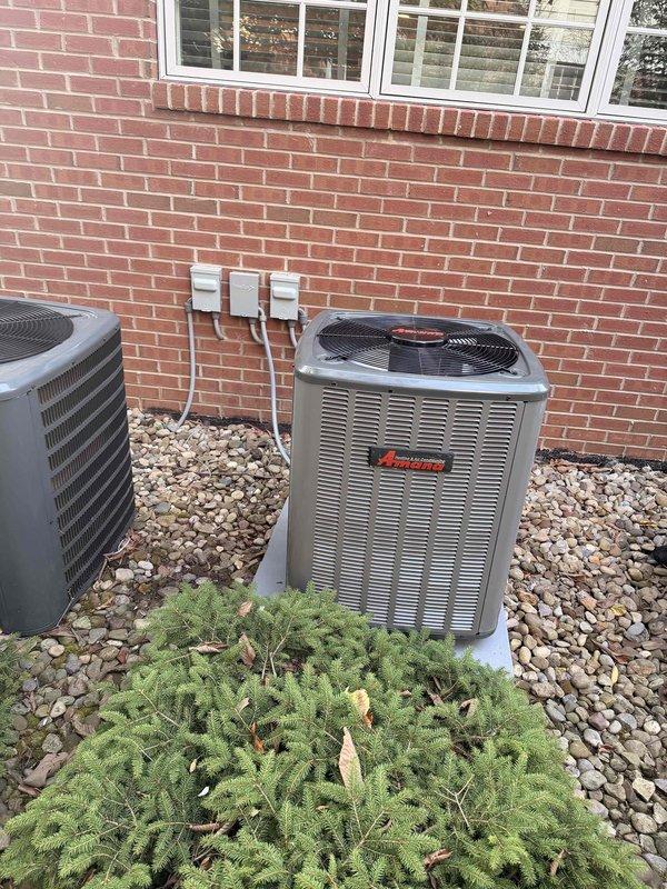 Completed installation of a new 80% efficiency furnace and air conditioning system as a secondary HVAC unit for the residence. The exterior AC condenser unit, an Amana brand model, was positioned on a concrete pad against the building foundation alongside the existing system, with proper electrical disconnects mounted on the exterior wall and conduit connections installed per code. Inside the basement mechanical room, installed the new furnace with complete ductwork distribution system extending from the unit to service the designated zones. All refrigerant lines were run between the indoor and outdoor components, properly insulated and secured. System was charged to manufacturer specifications, tested for proper airflow and temperature differential, and verified all electrical connections and safety controls are functioning correctly. Both heating and cooling modes were cycled and confirmed operational.