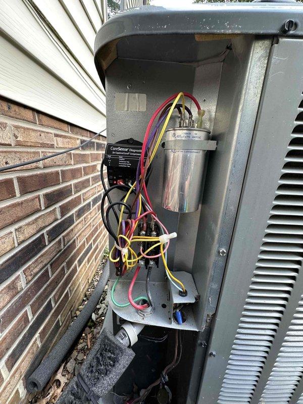 Performed routine HVAC cooling system maintenance on residential air conditioning unit. Inspected electrical components including capacitor, control board, and wiring connections, verifying all connections were secure and functioning properly. Measured supply air temperature at 55°F, confirming proper cooling operation and system performance within manufacturer specifications.