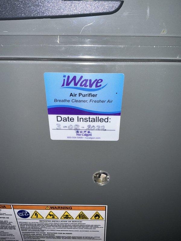 Conducted on-site consultation to assess existing HVAC system and provide furnace replacement options. Reviewed current equipment configuration including existing iWave air purification system and electrical service capacity to determine compatibility requirements for new furnace installation.
