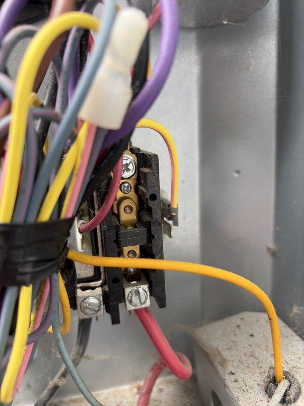 Completed scheduled preventive maintenance on residential cooling system as part of ongoing service plan. Performed comprehensive inspection of electrical connections at contactor and terminal block, verifying all wire terminations were secure and properly torqued. Utilized digital clamp meter to measure electrical parameters including voltage readings of 249V and amperage draw of 0.114A to confirm proper system operation and component functionality. All electrical connections found in acceptable condition with no signs of overheating or deterioration.
