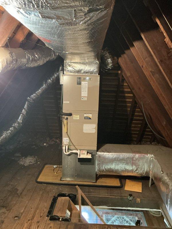 Completed HVAC estimate for Unico system replacement in attic space of home currently equipped with boiler heat and no existing cooling system. Assessed installation requirements for compact high-velocity air handler with insulated ductwork routing through attic rafters, including evaluation of condensate pump placement, PVC drain line configuration, and electrical supply requirements for new cooling equipment. Documented existing attic conditions, structural support platform, and available space for proposed system installation.