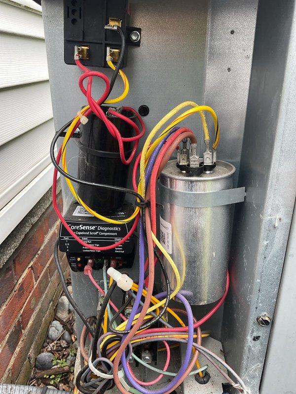 Completed comprehensive cooling system maintenance on outdoor HVAC unit, including electrical component inspection and diagnostics using CoreSense equipment to verify compressor operation and capacitor functionality. Performed system measurements and recorded temperature readings to confirm optimal performance of all components.