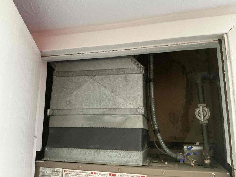 Conducted comprehensive evaluation of existing HVAC system accessed through attic panel for furnace replacement estimate. Inspected current air handler unit and associated ductwork in confined mechanical space, documenting equipment condition and configuration. Assessed galvanized ductwork connections, flexible duct routing, and valve assemblies on existing unit. Reviewed system specifications and manufacturer information to determine appropriate replacement options. Provided customer with furnace replacement alternatives and discussed financing solutions to facilitate equipment upgrade.