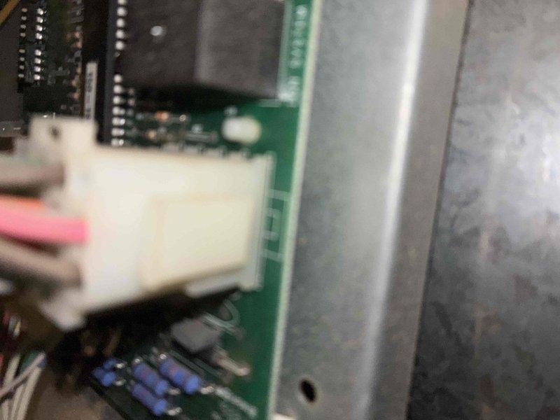 Completed cooling system tune-up on residential HVAC unit. Inspected and tested dual run capacitor and electrical connections, verified proper voltage at terminals, and examined control board components for proper operation. All systems found operating within normal parameters with no deficiencies noted.