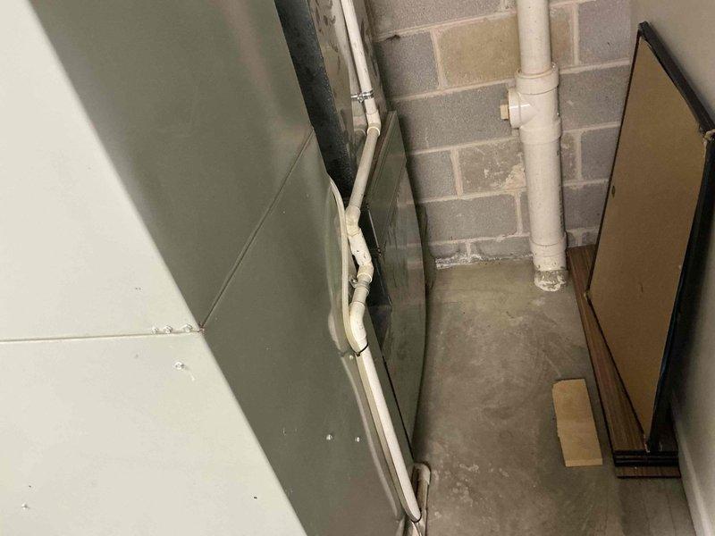 Completed diagnostic evaluation of existing HVAC system in basement mechanical room and presented comprehensive full system replacement options to customer. Documented current equipment configuration including ductwork, electrical panel setup with Challenger breaker box, and existing utility infrastructure to support replacement recommendations and scope of work planning.