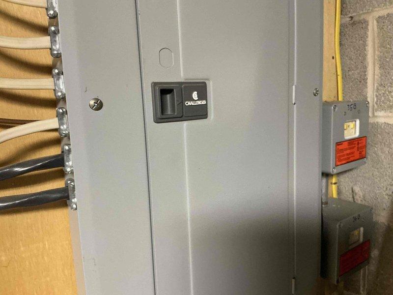 Completed diagnostic evaluation of existing HVAC system in basement mechanical room and presented comprehensive full system replacement options to customer. Documented current equipment configuration including ductwork, electrical panel setup with Challenger breaker box, and existing utility infrastructure to support replacement recommendations and scope of work planning.