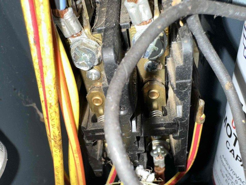 Completed comprehensive cooling system maintenance inspection on residential HVAC unit. Performed detailed examination of electrical control panel components, verifying all wire connections at terminal blocks were secure and properly torqued. Inspected and tested dual fuse assembly in disconnect housing, confirming proper amperage rating and electrical continuity. All electrical connections, capacitor, and safety devices found to be functioning within normal operating parameters, with system ready for continued cooling season operation.
