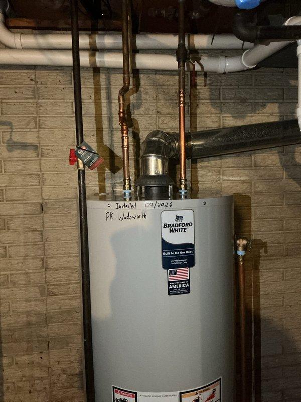 Returned to property and successfully installed a new 50-gallon Bradford White residential water heater with all required code upgrades. Installation included proper copper piping connections, circulation pump integration, pressure relief valve with discharge piping, and all necessary safety controls to bring the system into full compliance with current building codes.