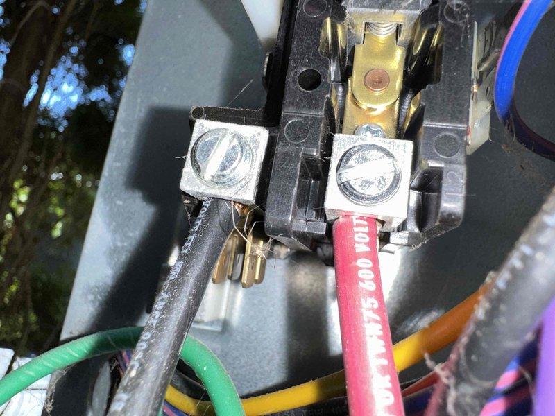 # HVAC Cooling Maintenance - Two Systems

Completed comprehensive preventive maintenance service on two cooling systems. Performed thorough inspection of electrical components including contactors, terminal connections, and wiring integrity. Verified proper voltage readings and measured amperage draw on compressor circuits using clamp meter, confirming system operating within manufacturer specifications at 4.252 amps DC. Inspected all electrical connections at contactor assembly, ensuring secure terminations on 600V rated wiring. All components found in good working condition with no immediate repairs required. Systems tested and left operating normally.