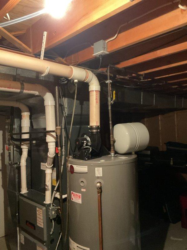 Performed comprehensive tune-up service on residential tanked water heater, including inspection of all safety labels, temperature and pressure relief valve, gas connections, and copper supply lines. Verified proper operation of heating elements, checked expansion tank mounting, inspected drain valve and base connections, and confirmed all components were functioning within manufacturer specifications.