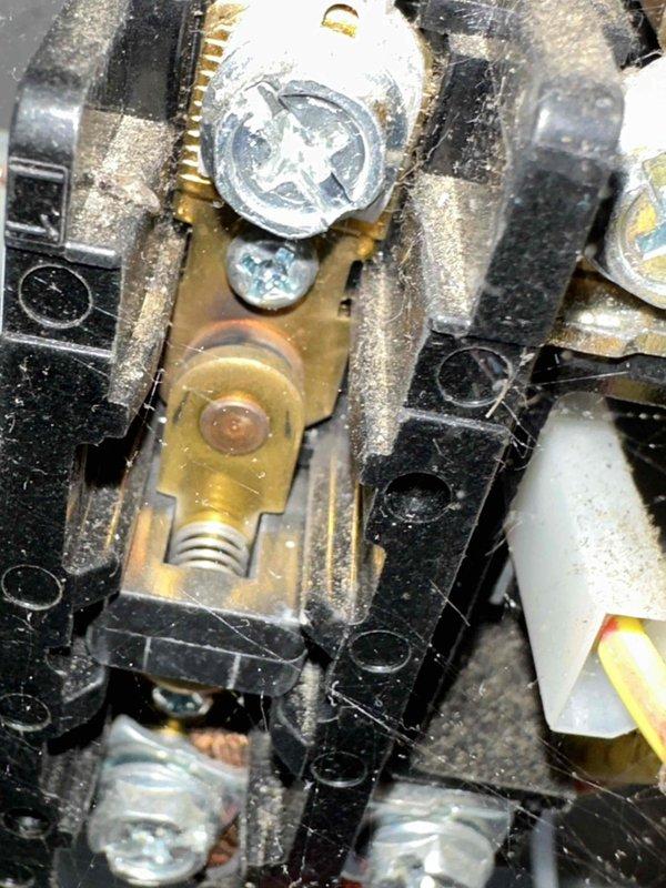 Completed preventive maintenance on 5-year-old Lennox cooling system. Inspected outdoor condensing unit electrical components including dual capacitors, control wiring harness, and terminal connections. All electrical connections found secure with normal operational wear; terminal block showing age-appropriate oxidation but functioning within specifications. Verified proper wire routing and strain relief. Unit operating efficiently with no immediate service concerns identified.