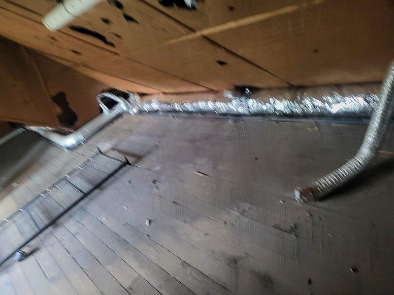 Completed warranty service for HVAC installation by sealing ductwork in attic space. Inspected and sealed all connections on rectangular metal supply plenum and flexible duct runs to ensure proper system performance and energy efficiency. All ductwork connections were secured and sealed per manufacturer specifications to prevent air leakage and maintain system integrity.