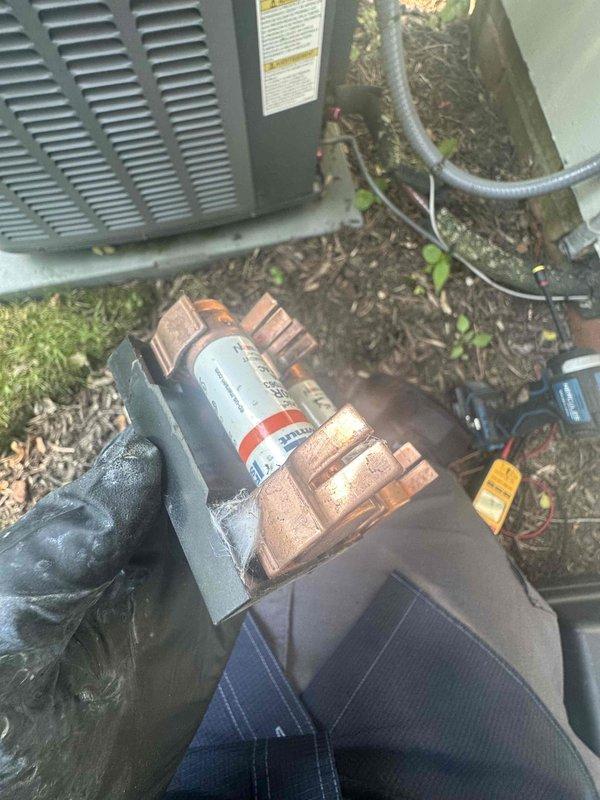 Completed comprehensive cooling season tune-up on residential HVAC system. Inspected and tested outdoor condensing unit, replaced failed capacitor to restore proper compressor operation, cleaned evaporator coil to remove dust and debris buildup between fins, and verified refrigerant line connections. System restored to optimal operating condition with improved airflow efficiency.