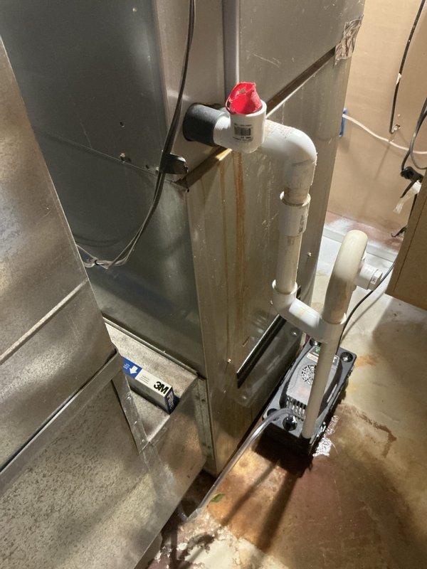 Conducted comprehensive assessment of aging residential HVAC system for full replacement options. Evaluated existing indoor air handler unit with condensate drainage system including PVC trap assembly and exterior AC condenser unit. Customer opted for complete system replacement due to age of equipment and breakdown on repairs, with installation scheduled for future appointment.